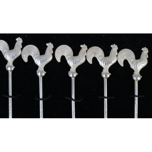 6 - Collection of silver to include George Jensen knife and fork, tea spoons, and cocktail sticks