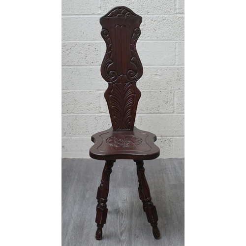661 - Carved spinning chair