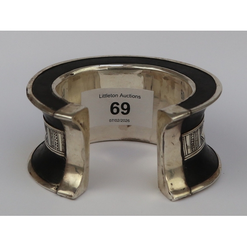69 - Silver and ebony cuff bangle
