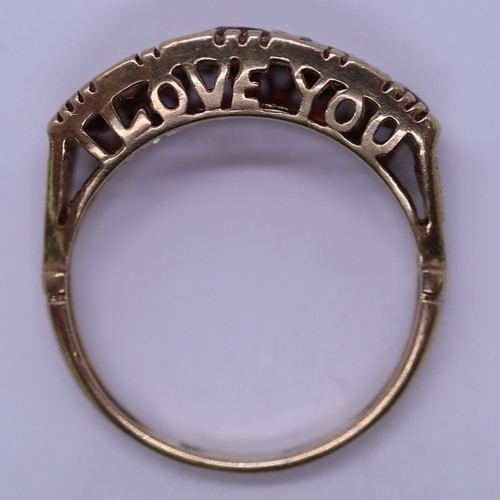 125 - 9ct gold 5 heart shaped garnet set ring, plus small white (diamond like) stones surrounding, and ben... 