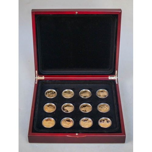 173 - A collection of 12 .999 silver 24ct gold plated Solomon Islands, £25 airplane themed coins, presente... 