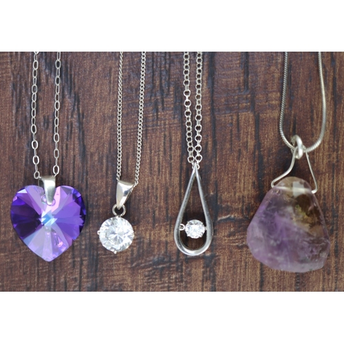 102 - 4 silver stone set pendants on silver chains
