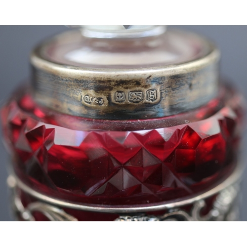 14 - Hallmarked silver and glass perfume bottle