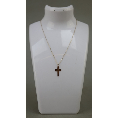 36 - 2 x 9ct gold cross pendants on 9ct gold chains - Approx 2.4g