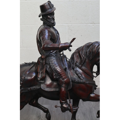 461 - A monumental bronze of William of Orange astride his horse, mounted to a marble base marked De Muich... 