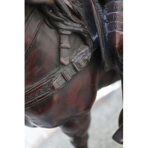 461 - A monumental bronze of William of Orange astride his horse, mounted to a marble base marked De Muich... 