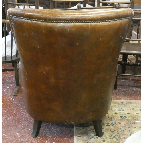 681 - Brown leather armchair
