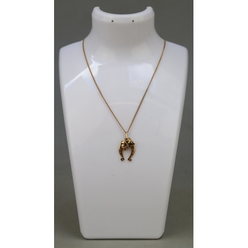 79 - 14ct gold necklace with (possibly 18ct) horseshoe pendant - Approx 5.6g