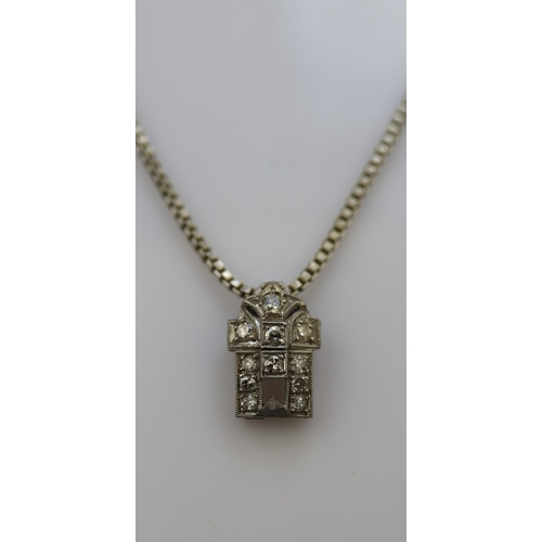 81 - 14ct white gold pendant set with diamonds on 835 silver chain