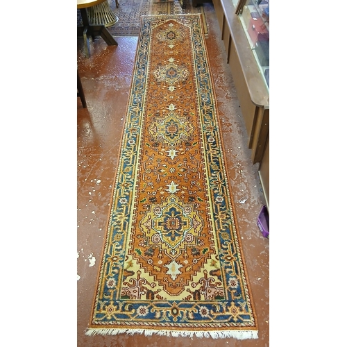 Red patterned runner