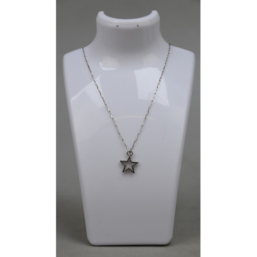 32 - Hallmarked silver star pendant on silver chain