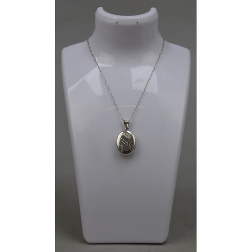33 - Hallmarked silver locket on silver chain