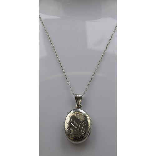 33 - Hallmarked silver locket on silver chain