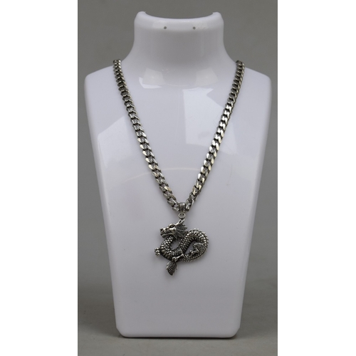 38 - Hallmarked silver curb chain with dragon pendant - Approx 39g&nbsp;