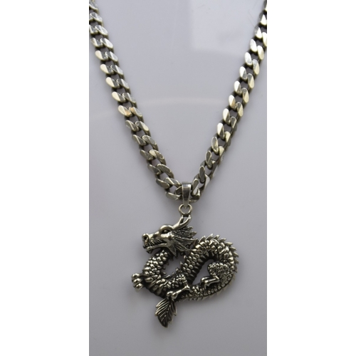 38 - Hallmarked silver curb chain with dragon pendant - Approx 39g&nbsp;