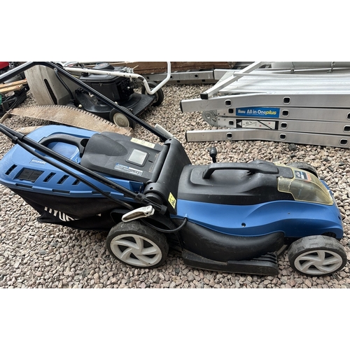 27 - Hyundai battery powered mower with charger and handbook