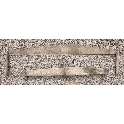 34 - Two handed cross cut saw together with a yolk
&nbsp;