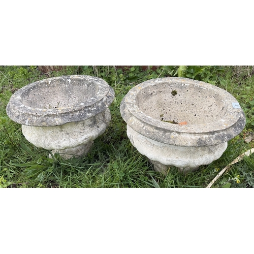52 - Pair stone planters on plinth&nbsp;