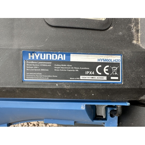 27 - Hyundai battery powered mower with charger and handbook
