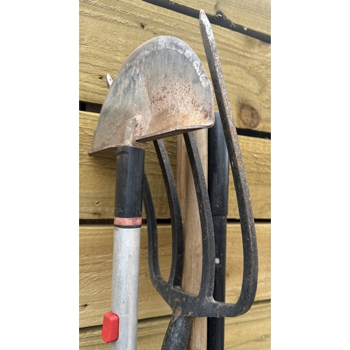 37 - Garden toolset to include lawn rakes, fork, edger, hoe and cultivator