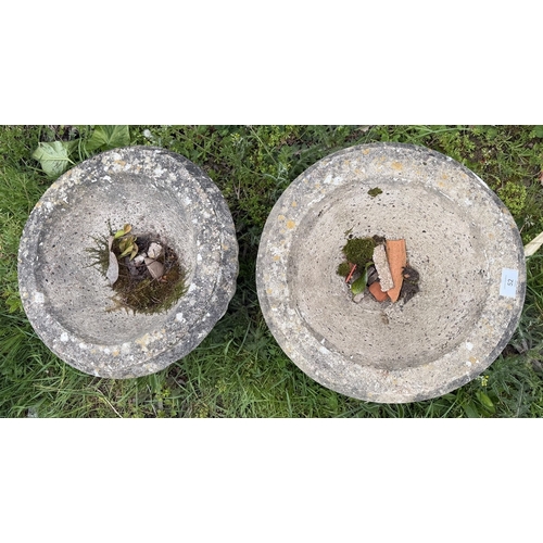 52 - Pair stone planters on plinth&nbsp;