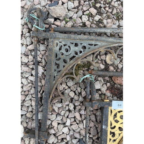 64 - Pair of cast iron and guilt brackets