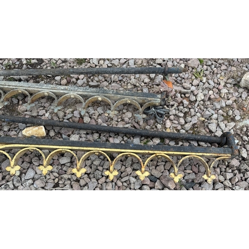 64 - Pair of cast iron and guilt brackets