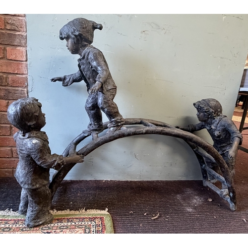 67 - Bronze - A large cast garden sculpture of children playing on a climbing frame - Approx L: 120cm H: ... 
