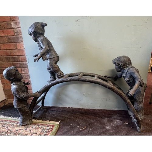 67 - Bronze - A large cast garden sculpture of children playing on a climbing frame - Approx L: 120cm H: ... 