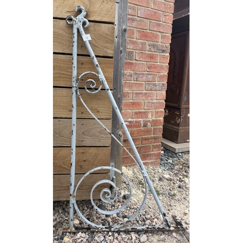 68 - Pair of large iron hanging wall brackets