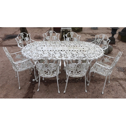 388 - Large Cast Metal Garden Dining Set &ndash; Ornate vintage cast metal table with eight chairs. Table ... 
