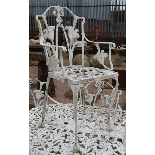 388 - Large Cast Metal Garden Dining Set &ndash; Ornate vintage cast metal table with eight chairs. Table ... 