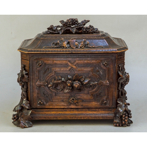 217 - Fine carved Black Forest decanter box complete with original contents - circa late 1800s