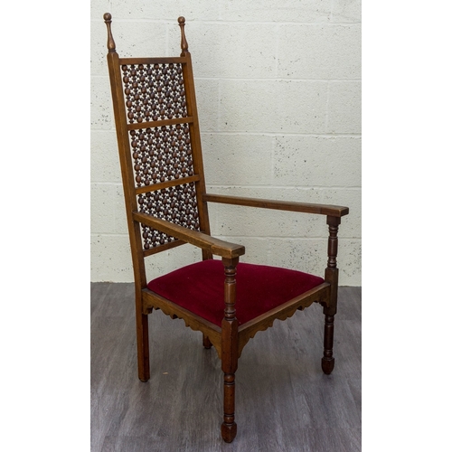 392 - Liberty & Co caivene walnut & mashriba panel back armchair. Illutrated in the Cabinet Maker,... 