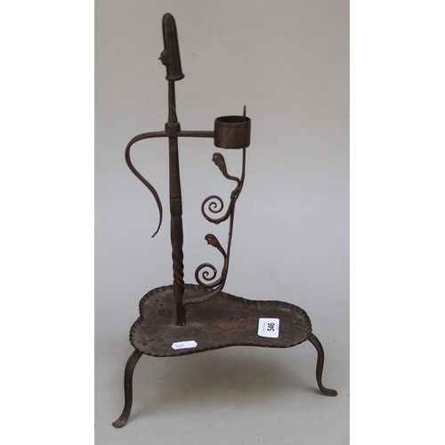 546 - Interesting wrought iron Arts and Crafts candle stick with snuffer