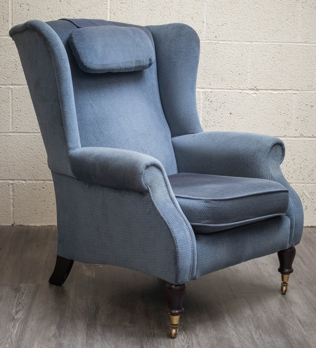Blue wing backed armchair by Parker Knoll