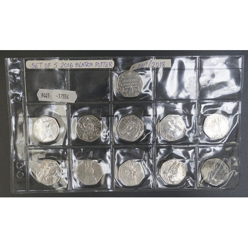Coins - Collection of 50p coins in wallets