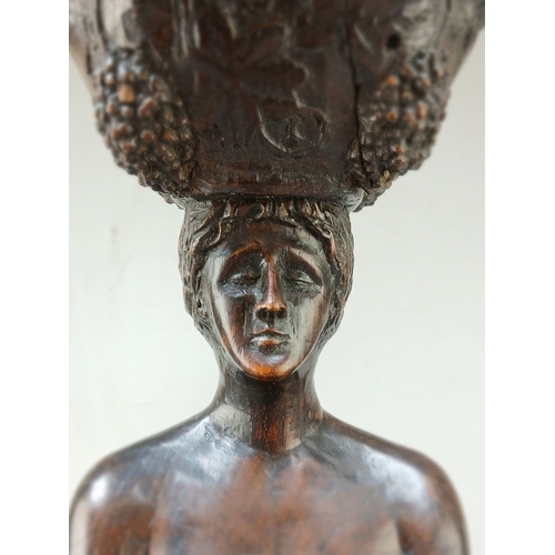 216 - 18thC Provincial carving of a nude with basket on her head - Approx H:67cm