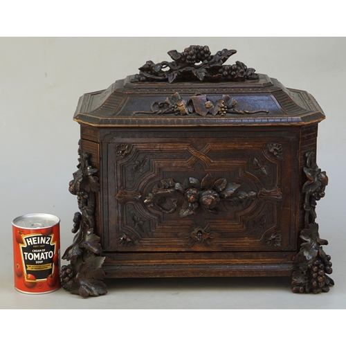 217 - Fine carved Black Forest decanter box complete with original contents - circa late 1800s