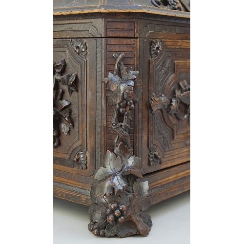 217 - Fine carved Black Forest decanter box complete with original contents - circa late 1800s