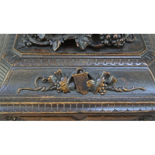 217 - Fine carved Black Forest decanter box complete with original contents - circa late 1800s
