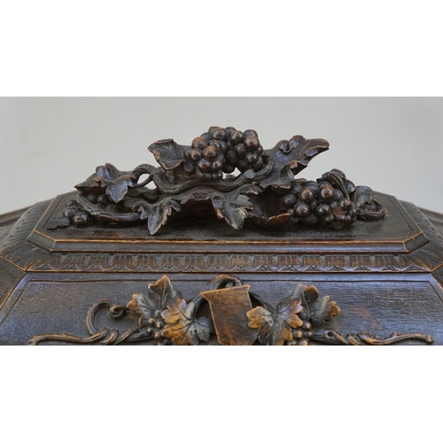 217 - Fine carved Black Forest decanter box complete with original contents - circa late 1800s