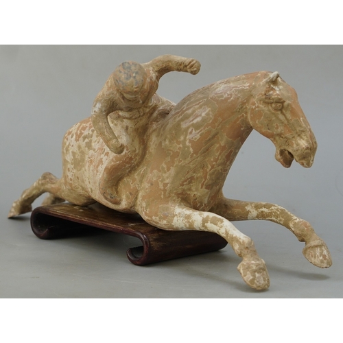 261 - Chinese Terracotta Tang Dynasty polo player on horseback - Flying horse motif. Traces of polychrome ... 
