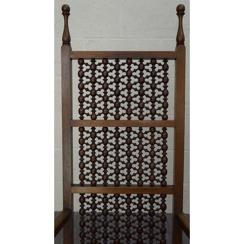 392 - Liberty & Co caivene walnut & mashriba panel back armchair. Illutrated in the Cabinet Maker,... 