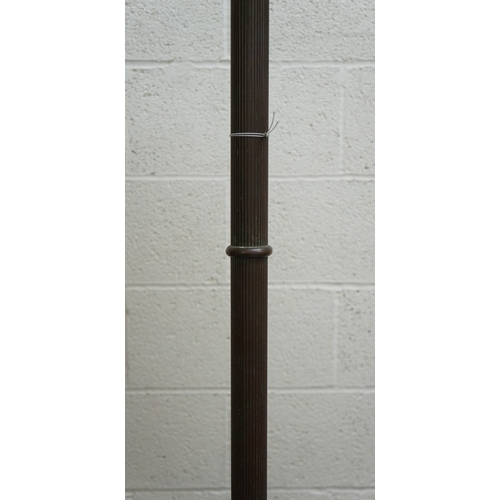 551 - Floor lamp by Handel with pine woods sunset shade, patinated bronze and painted slag glass shade wit... 