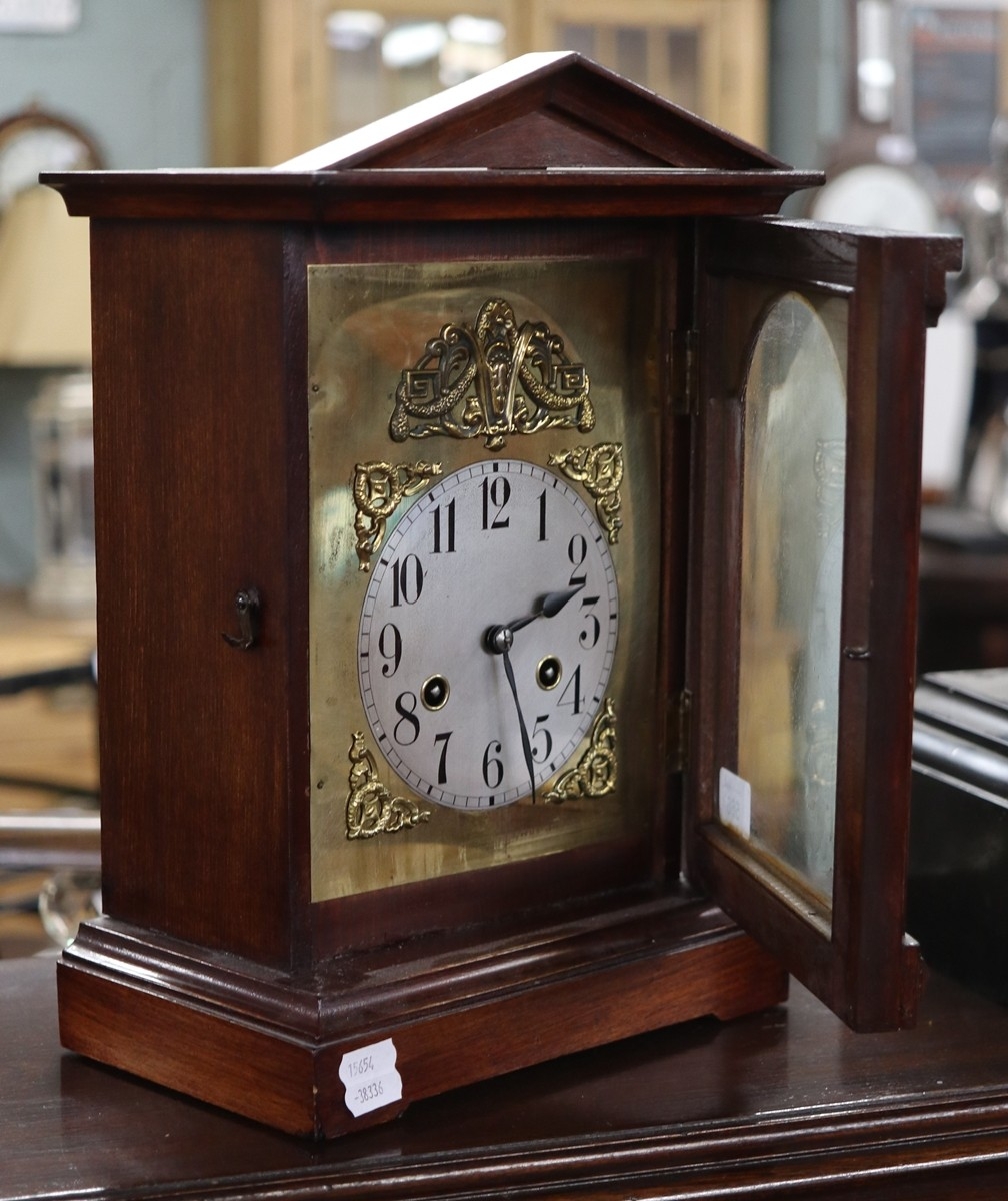 Mantel clock with brass inlay