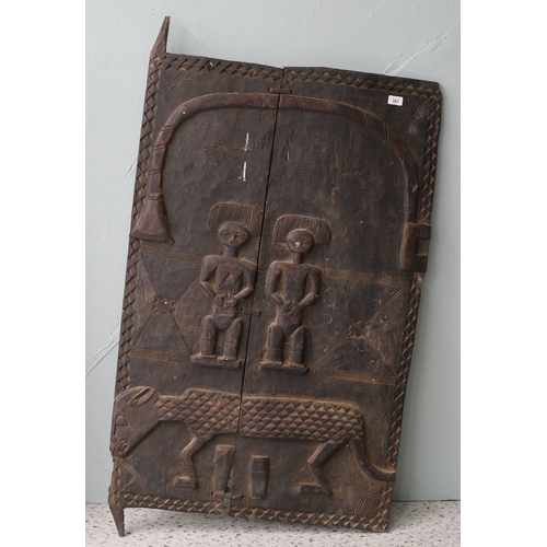 397 - Tribal hand carved door from the Baule people of the Ivory Coast - Approx W: 74cm H: 132cm