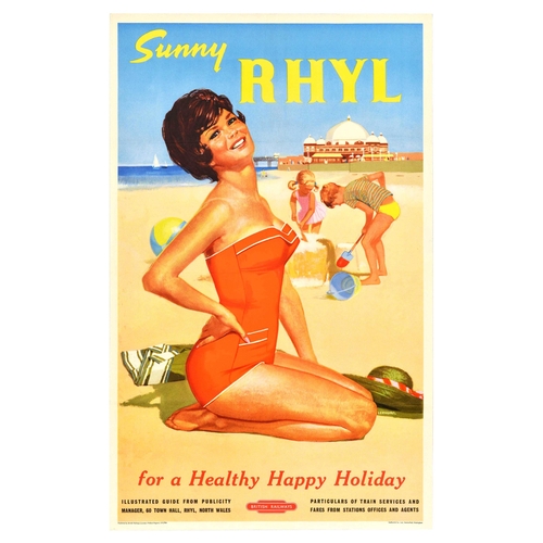 Travel Poster Sunny Rhyl Wales British Railways Beach BR. Original vintage travel poster by British Railways - Sunny Rhyl for a Healthy Happy Holiday - featuring an illustration of a smiling lady in an orange swimsuit in the foreground and children playing and making sandcastles, with sailboats, pier, and Welsh seafront in the distance. Published by British Railways (London Midland Region). Printed in Great Britain by Stafford & Co., Ltd., Netherfield, Nottingham.   Good condition, folds, creasing, some small tears on edges. Country of issue: UK, designer: Leonard, size (cm): 102x64, year of printing: 1950s.