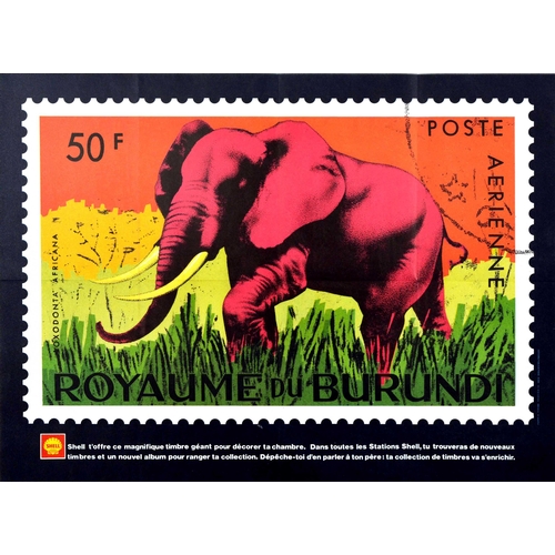 Advertising Poster Shell Burundi Postal Stamp Africa Elephant. Original vintage advertising poster for Shell Oil - Royaume Du Burundi / Kingdom Of Burundi - featuring great artwork designed as a postage stamp depicting an elephant in pink walking through tall green grass with yellow trees and an orange sky in the background, the text reading - Loxodonta Africana 50F Poste Aerienne / African bush elephant Air Mail - with the Shell logo and information on the black border below: Shell t'offre ce magnifique timbre geant pour decorer ta chambre. Dans toutes les Stations Shell, tu trouveras de nouveaux timbres et un nouvel album pour ranger ta collection. Depeche toi d'en parler a ton pere: ta collection de timbres va s'enrichir / Shell offers you this magnificent giant stamp to decorate your room. In all the Shell stations you will find new stamps and a new album to store your collection. Hurry and tell your father: your stamp collection will grow richer. Horizontal. Excellent condition, original folds.  Country of issue: France, designer: unknown, size (cm): 44x60, year of printing: 1960s.