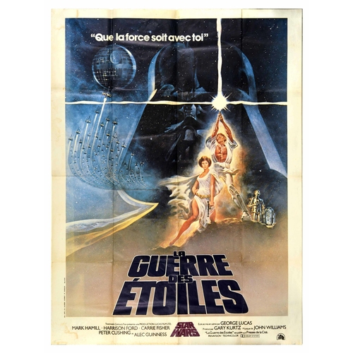 Movie Poster Star Wars La Guerre Des Etoiles George Lucas. Original vintage movie poster for La Guerre Des Etoiles the first film in the iconic Star Wars saga by George Lucas starring Mark Hamill as Luke Skywalker, Harrison Ford as Han Solo, Carrie Fisher as Princess Leia, Alec Guinness as Obi Wan-Kenobi, Anthony Daniels and Kenny Baker as the droids C3-PO and R2-D2, Peter Mayhew as Chewbacca, Peter Cushing as Grand Moff Tarkin and David Prowse as Darth Vader, featuring a dynamic image of Princess Leia holding a gun in front of Luke Skywalker holding up his lightsabre with the robot droids R2D2 and C3PO standing behind them, an image of Darth Vader dominating the starry night sky with tie-fighters flying towards the Death Star. Large size. Acceptable condition, folds, creasing, staining, foxing, tears, tape along folds on reverse. Country of issue: France, designer: Tom Jung, size (cm): 160x120, year of printing: 1977.